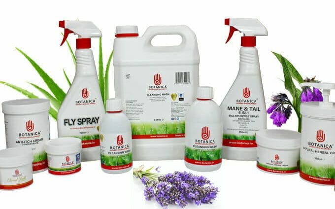 A variety of natural herbal pest control products on a white background.
